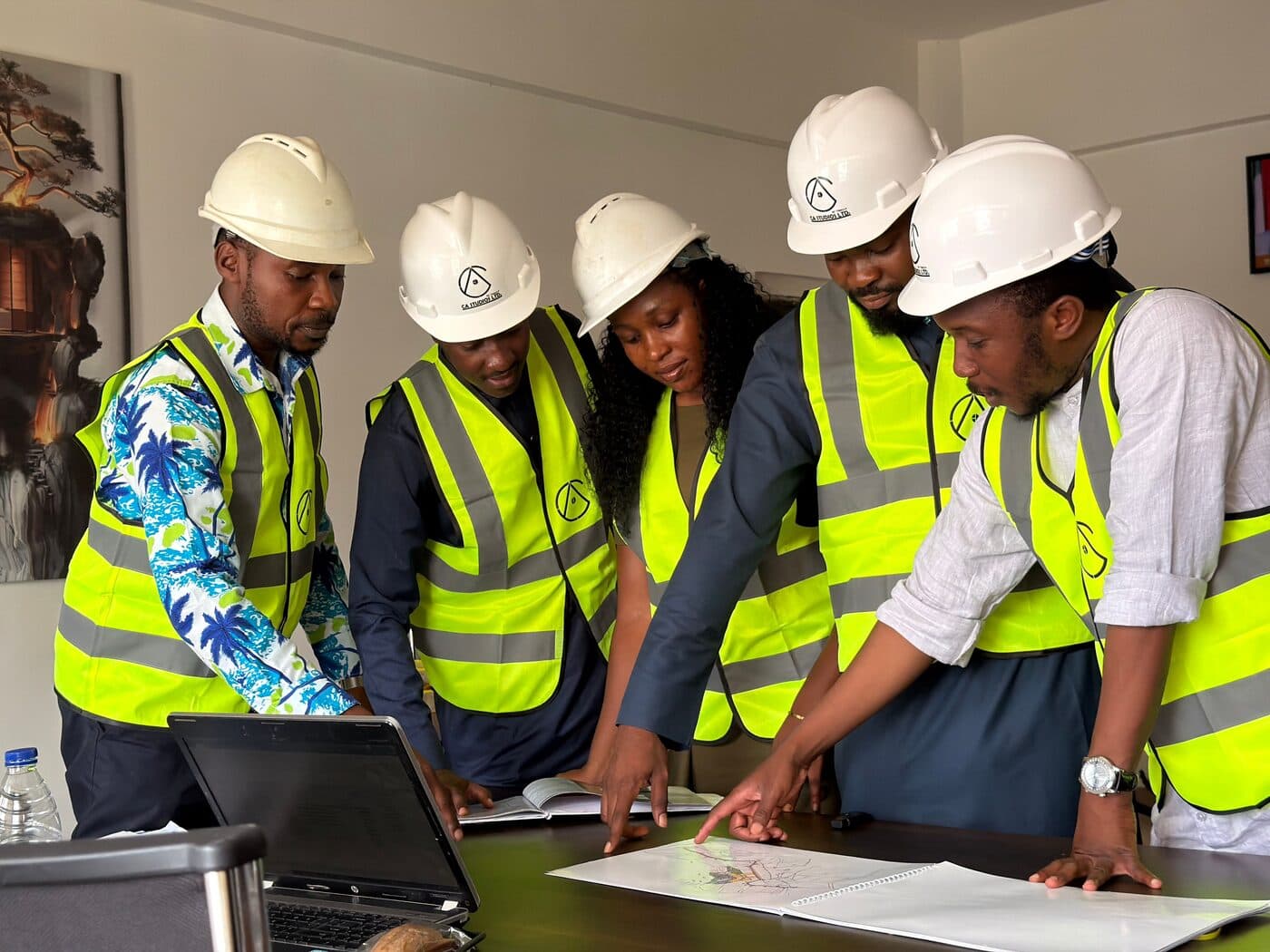 A team of technicians planning work